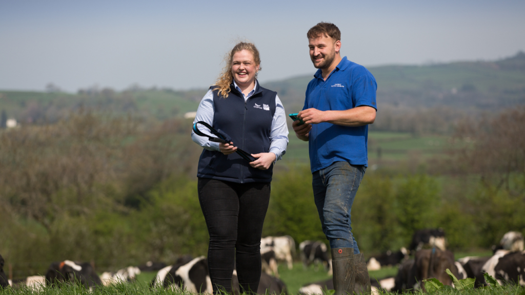 Genus ABS staff member talking with herdsman